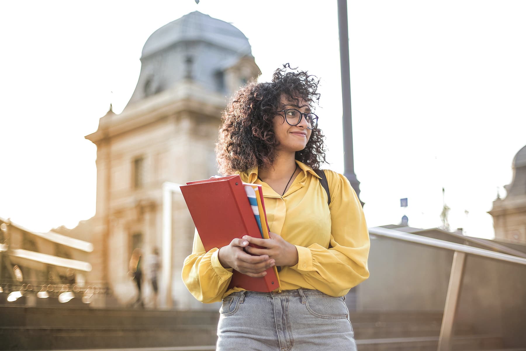 college student holding books