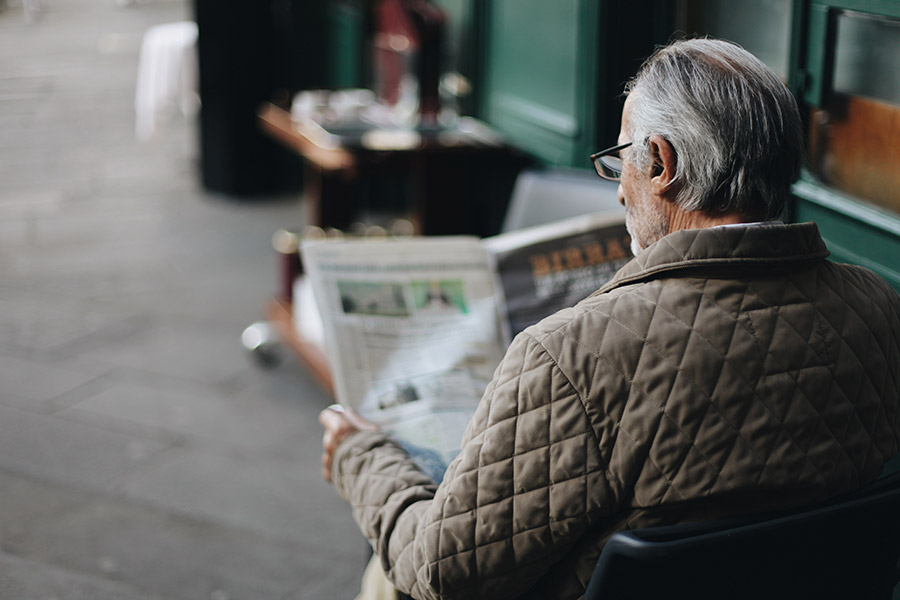 man reading paper